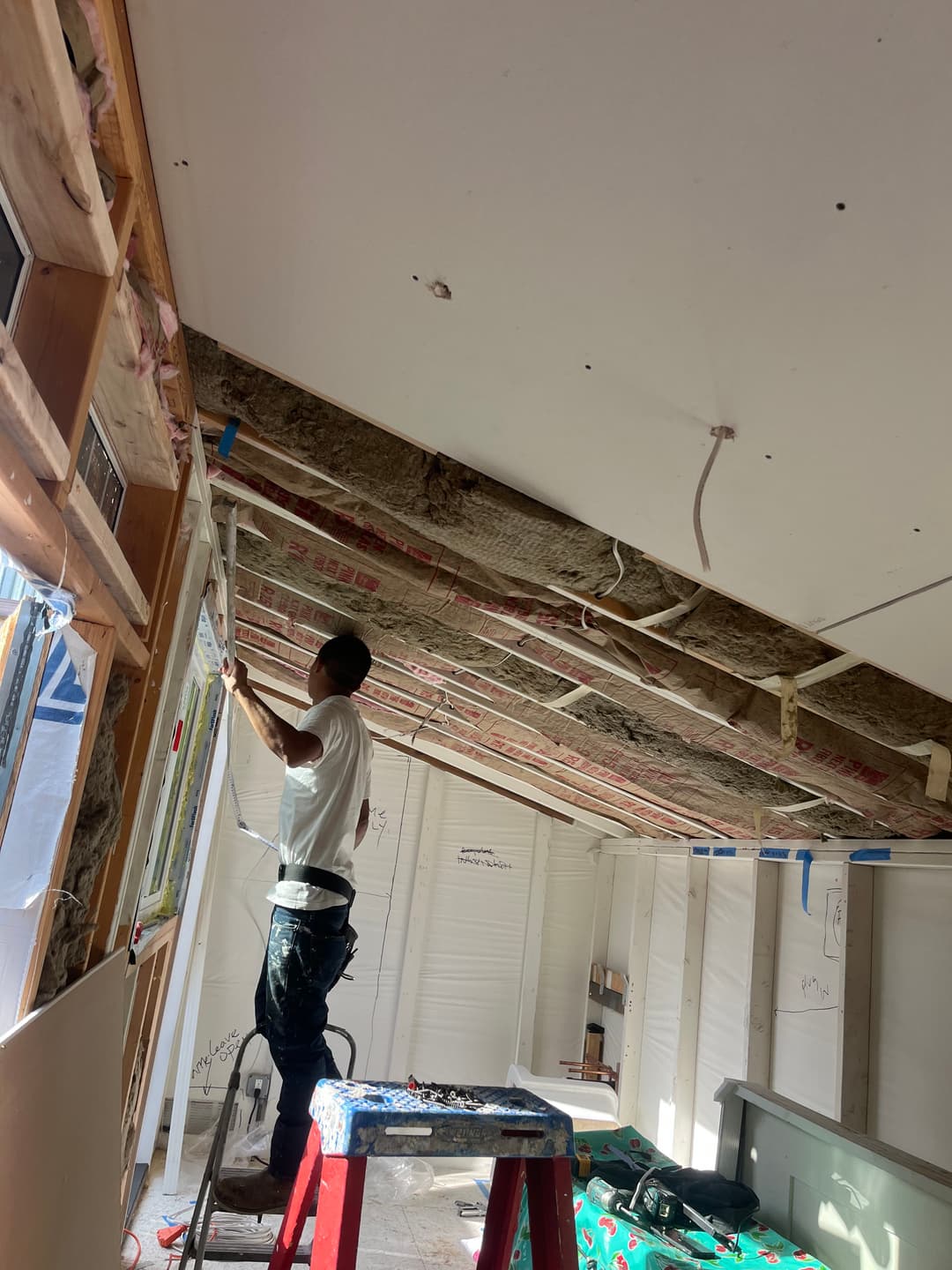 Ceiling demolition and framing work during interior renovation project
