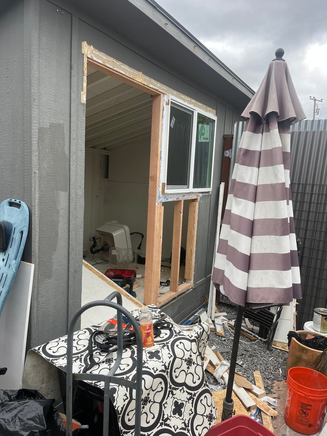 Home interior under renovation with materials staged for flooring work