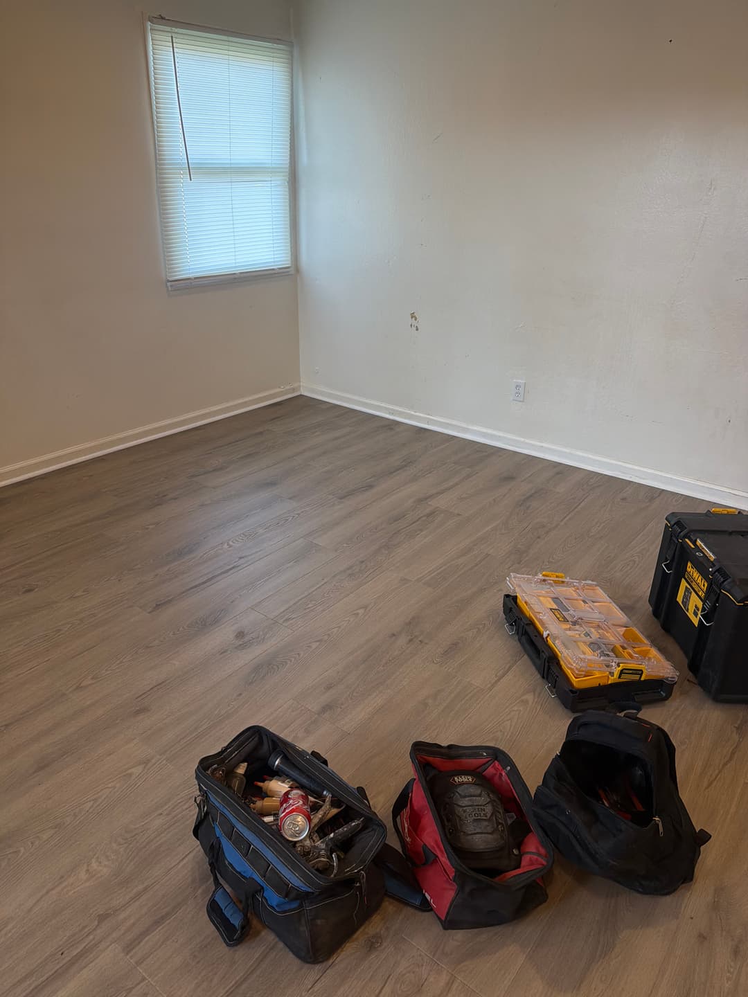 Completed hardwood flooring installation with smooth finish and clean edges