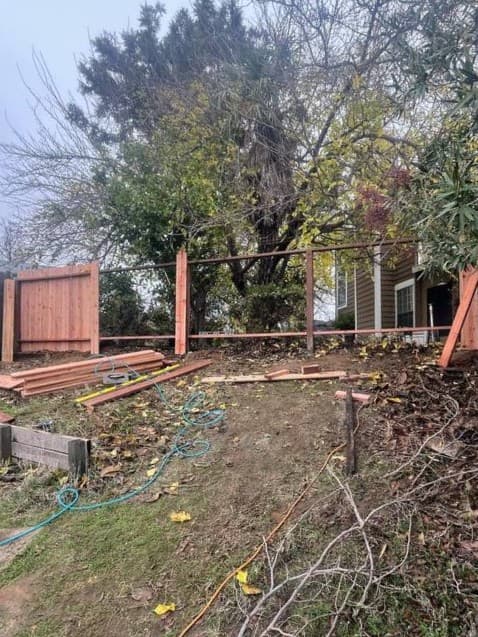Fence and yard preparation work for residential outdoor improvement